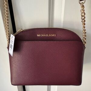 Michael Kors burgundy cross-body with adjustable gold chain